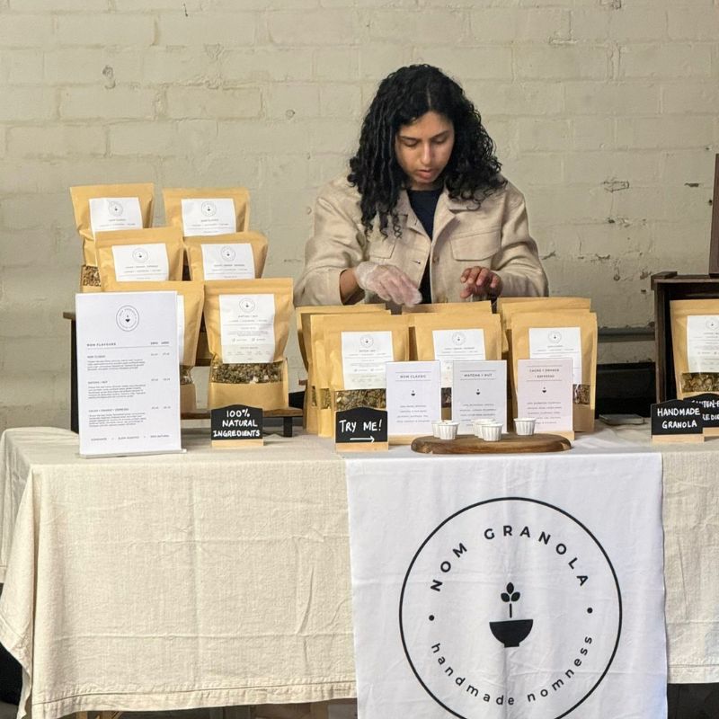 Nom Granola founder at Leicester food market stall selling handcrafted small batch granola
