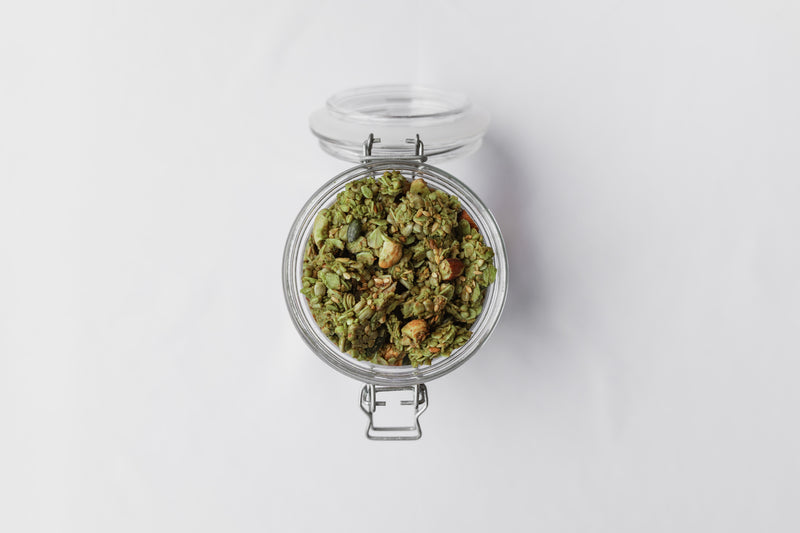 Matcha + Nut artisan Nom Granola in a glass jar honey sweetened with buckwheat almonds macadamia and coconut